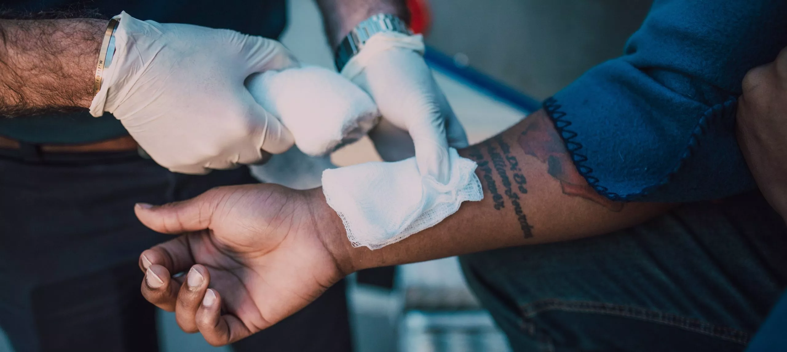 someone bandaging an arm because of a dog bite personal injury